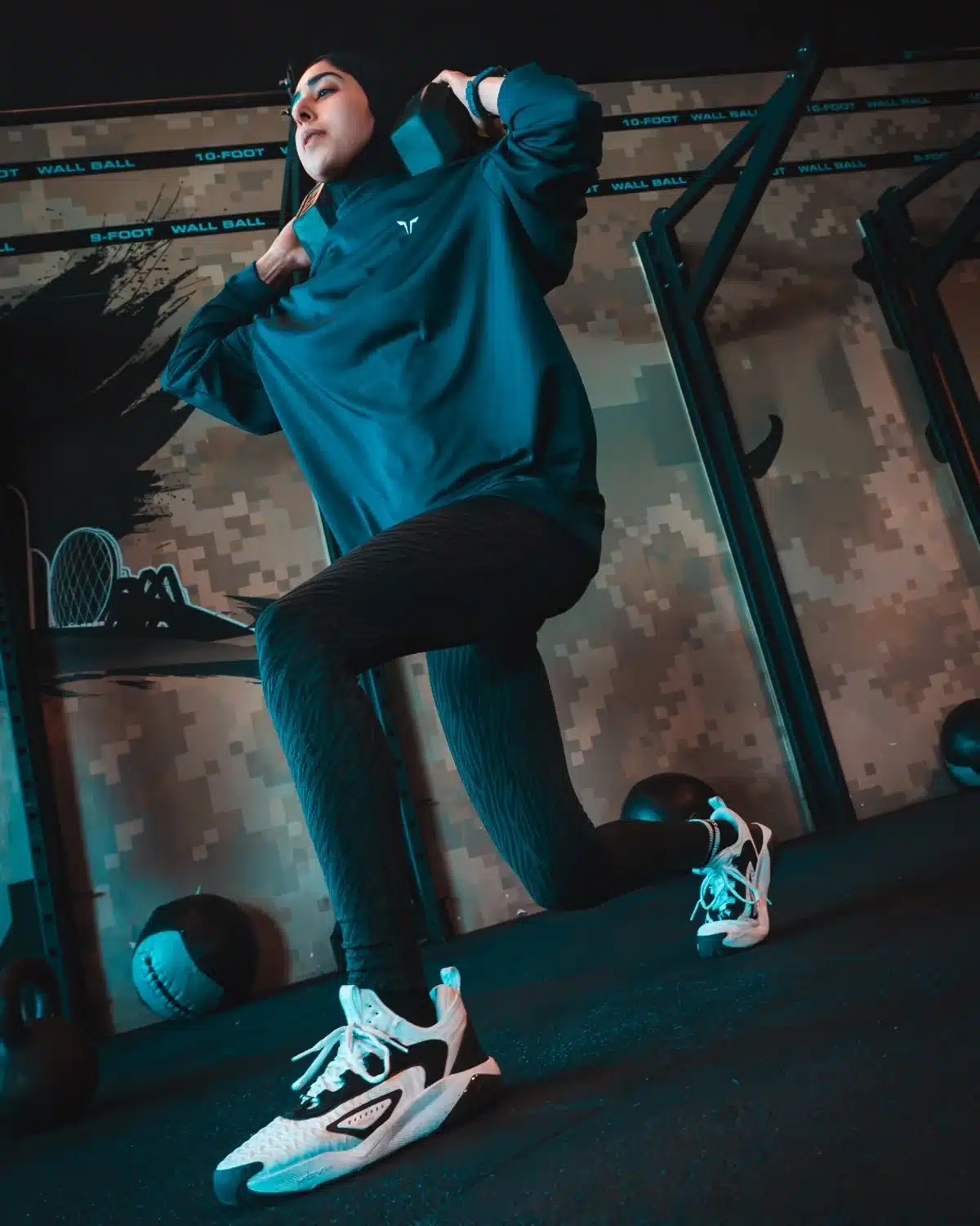 Athlete performing a weighted lunge